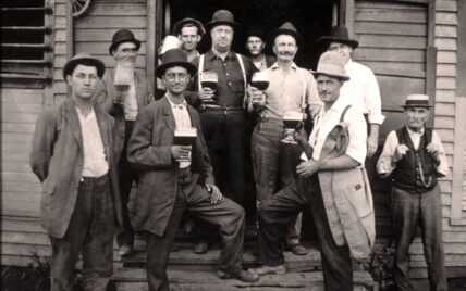 Vintage photo of men drinking beer