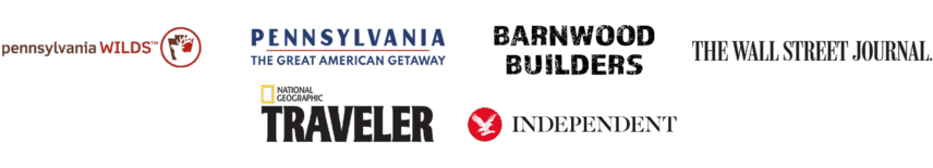Logos of media outlets and tourism organizations where Gateway Lodge has been featured, including Pennsylvania Wilds, Pennsylvania The Great American Getaway, Barnwood Builders, The Wall Street Journal, National Geographic Traveler, and The Independent, highlighting our recognized excellence in Cook Forest, Pennsylvania.