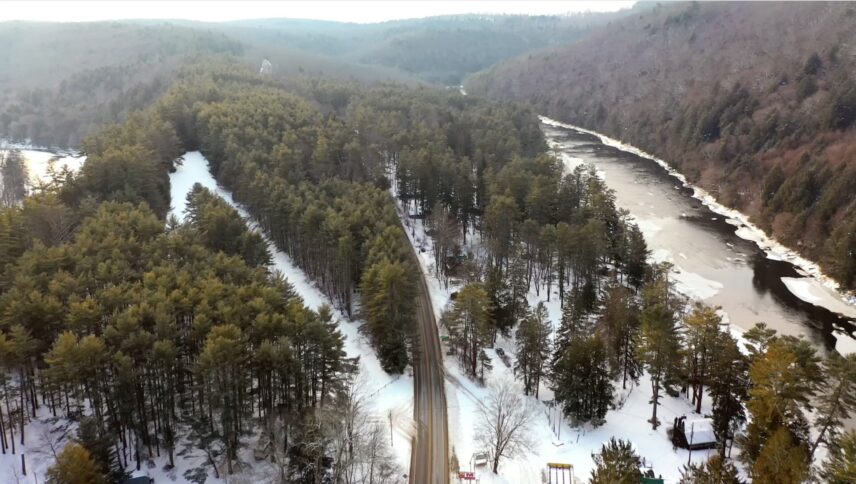 Wintertime aerial view of Hemlock and Pine trees along the Clarion River in Cook Forest State Park, Pennsylvania